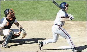 Keith Lockhart hits a three-run homer in the sixth inning