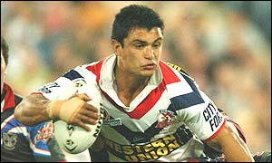 The Roosters' Craig Wing carries the ball upfield