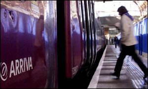 Passenger getting on Arriva train