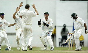 Glenn McGrath takes the wicket of Pakistan's Shoaib Akhtar