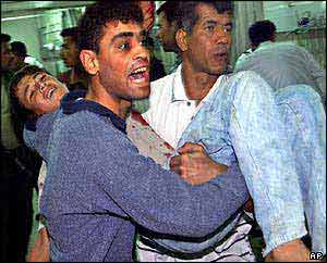 Young person being carried to hospital