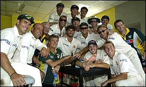 Australia pose for an official victory photograph after defeating Pakistan