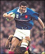 Emile Ntamack takes on the Australian defence while playing for France