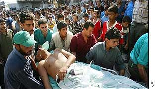 Wounded Palestinian on stretcher