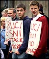 Sinn Fein protesters outside a West Belfast police station
