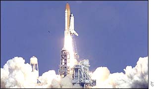 Space shuttle taking off, AP