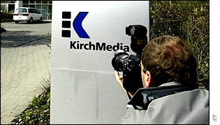 A photographer outside Kirch's offices