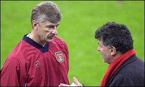 Arsene Wenger (left) and Arsenal vice-chairman David Dein