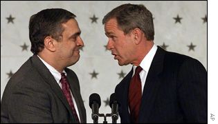 CIA director George Tenet with President Bush