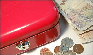 A moneybox with notes and coins