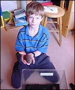 Andrew with a giant African land snail 