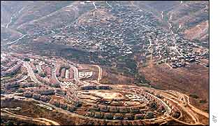 Olive groves separating the Beitar settlement and the Palestinian village of Nahhalin