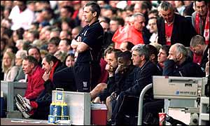 George Burley watches Ipswich get relegated, just a year after being named manager of the year