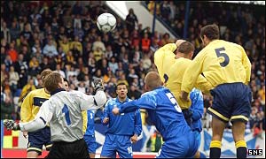 Christian Dailly rises to open the scoring