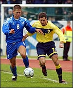 Jackie McNamara in action for Scotland