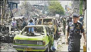 Indonesian police guard the blast area
