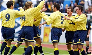 Christian Dailly is congratulated after scoring