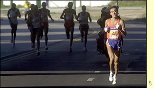 Japans Toshinari Takaoka breaks away from the pack 18 miles into the race