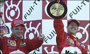 Rubens Barrichello and Michael Schumacher on the podium after the Japanese Grand Prix