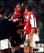 Lazio's Sinisa Mihajlovic squares up to Patrick Vieira of Arsenal