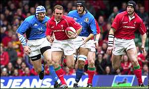 Wales centre Andy Marinos makes a break against Italy in the 2002 Six Nations match