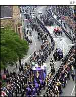 Mourners line up the streets