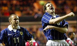 Paul Devlin rushes to congratulate Stevie Crawford