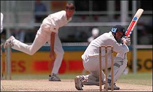 Atherton ducks a bouncer during a 1994 Test match in Brisbane