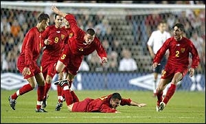 Macedonia's players celebrate Vanco Trajanov giving the side the lead
