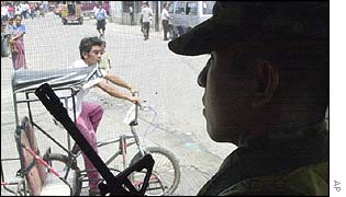 A Philippine Marine soldier keeps a tight watch from his post in Zamboanga