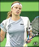 Kim Clijsters is relieved to make the last eight