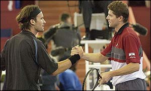 Moya and Novak shake hands at the end of their match