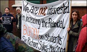 students holding banner