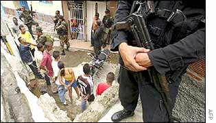 Suspected rebels are detained in Medellin