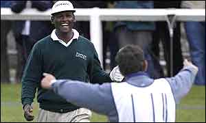 Vijay Singh celebrates his win over Retief Goosen