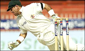 Ponting goes down after being struck by Sami
