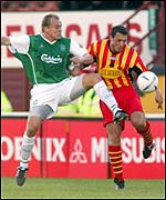 Derek Whyte feels the presence of big Mixu