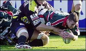 Murphy dives over for one of his brace of tries