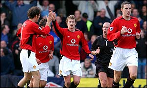 Manchester United striker Ole Gunnar Solskjaer celebrates his equaliser