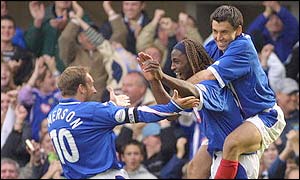 Portsmouth celebrate taking the lead against Coventry