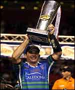 St Helens skipper Chris Joynt lifts the Grand Final trophy