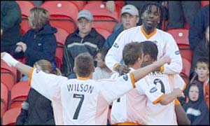 Eugene Dadi celebrates Livingston's winner