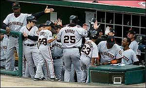 San Francisco's Barry Bonds celebrates a home run