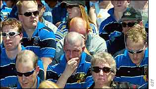 Rugby player weeps at service in Coogee, Sydney (PA/AP)