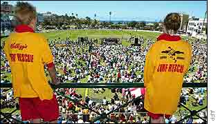 Surf lifesavers watch the memorial service 