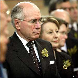 John Howard and wife Janette at service in Canberra
