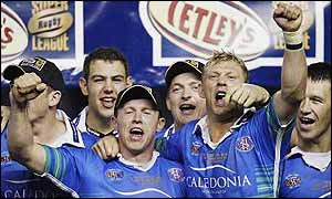 St Helens celebrate after winning the Super League Grand Final 