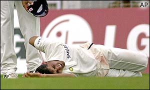 India captain Sourav Ganguly holds his back 