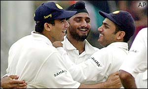 Zaheer Khan, Harbhajan Singh and Virender Sehwag celebrate the wicket of Windies batsman Gareth Breese