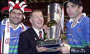 Ian Millward celebrates Grand Final success with Barry Ward (left) and Chris Joynt (right)